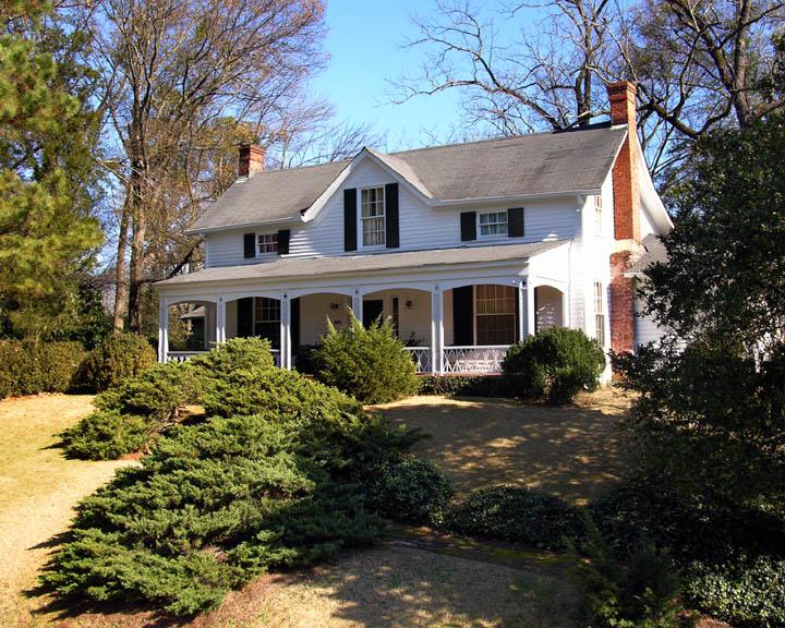 a plain white house that happens to be very old.